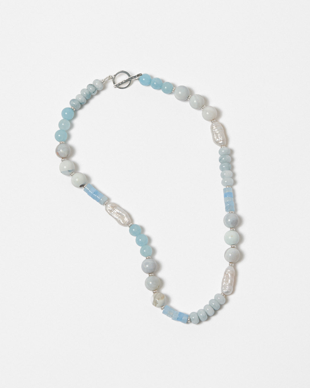 Necklace with blue and white beads on a white background
