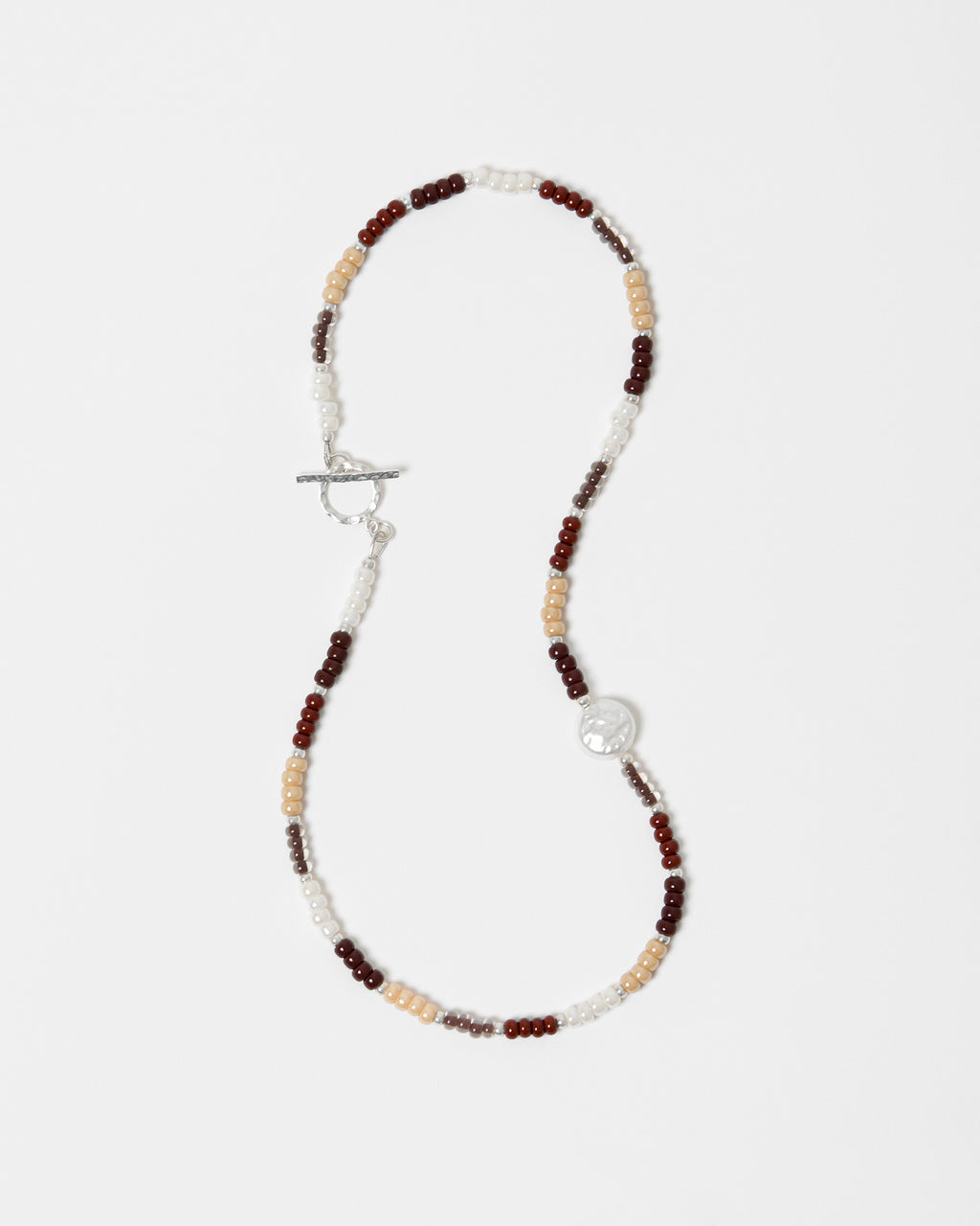 Necklace with multicolored beads on a white background