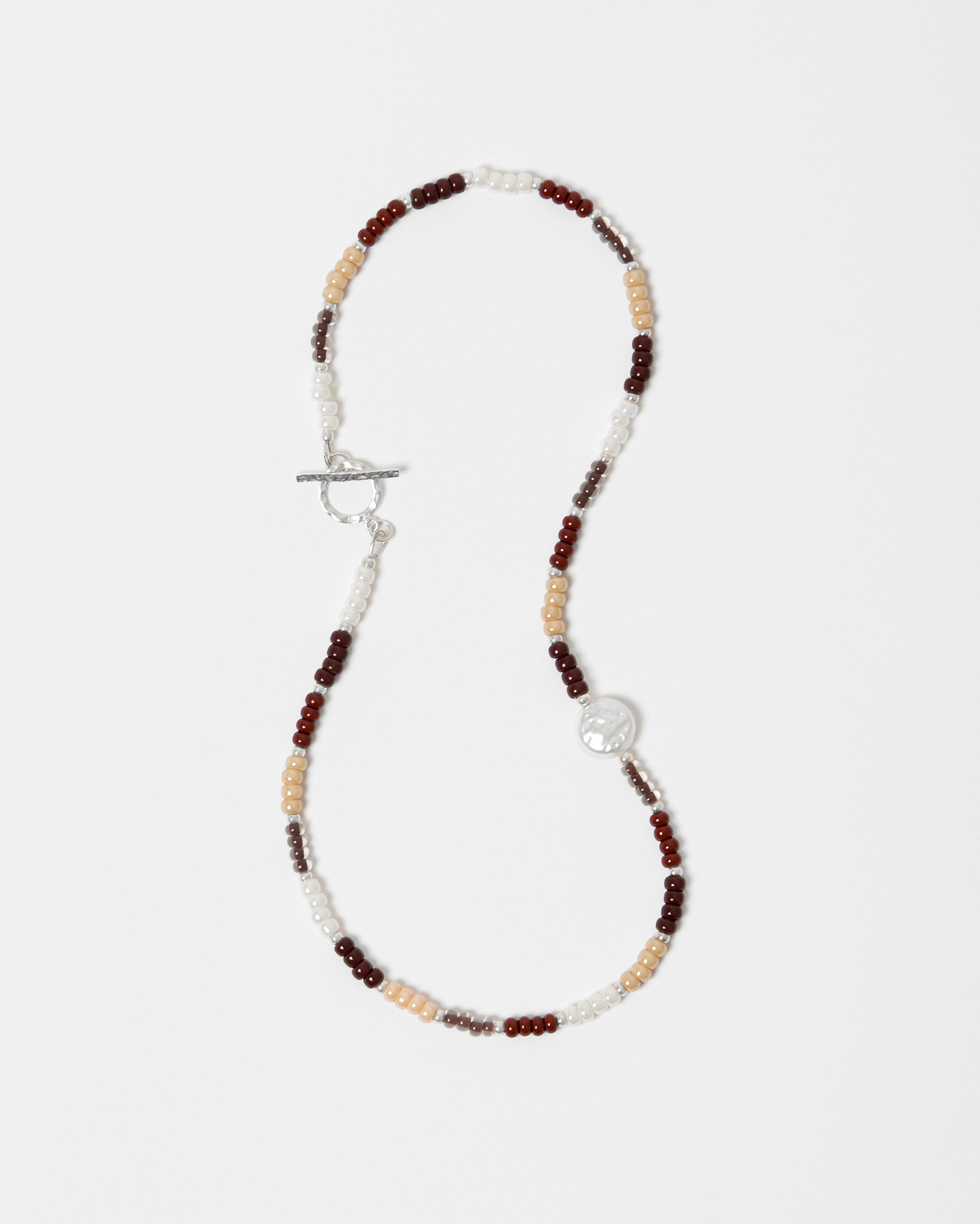 Necklace with multicolored beads on a white background