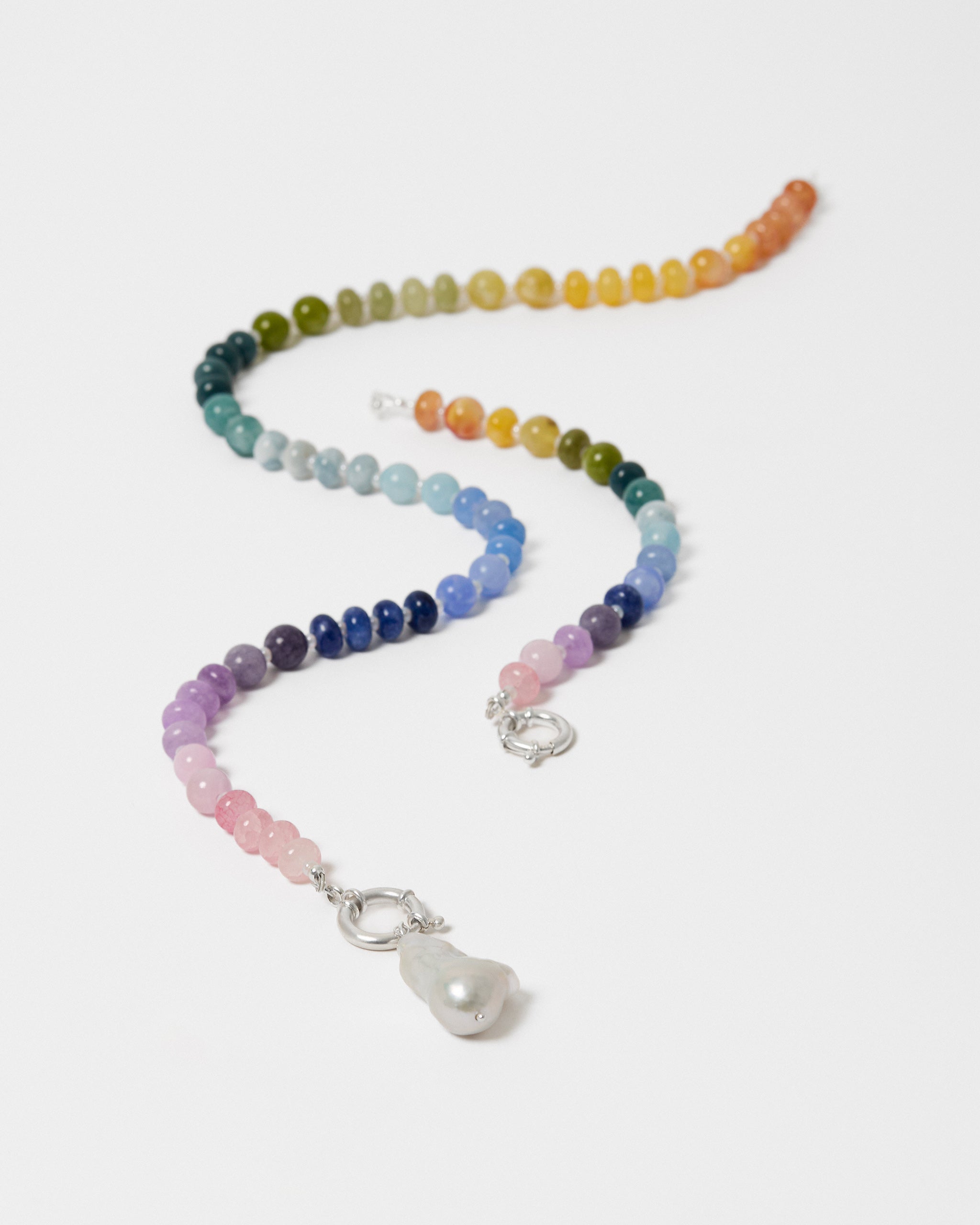Multicoloured beaded necklace with a silver clasp and a freshwater pearl pendant