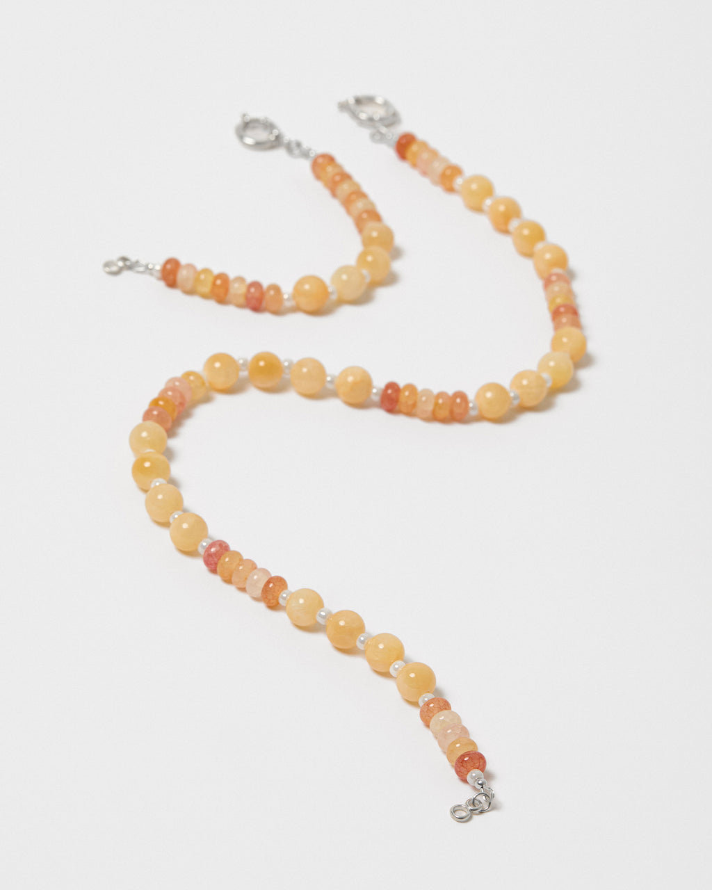 Beaded sterling silver jewellery on a white background