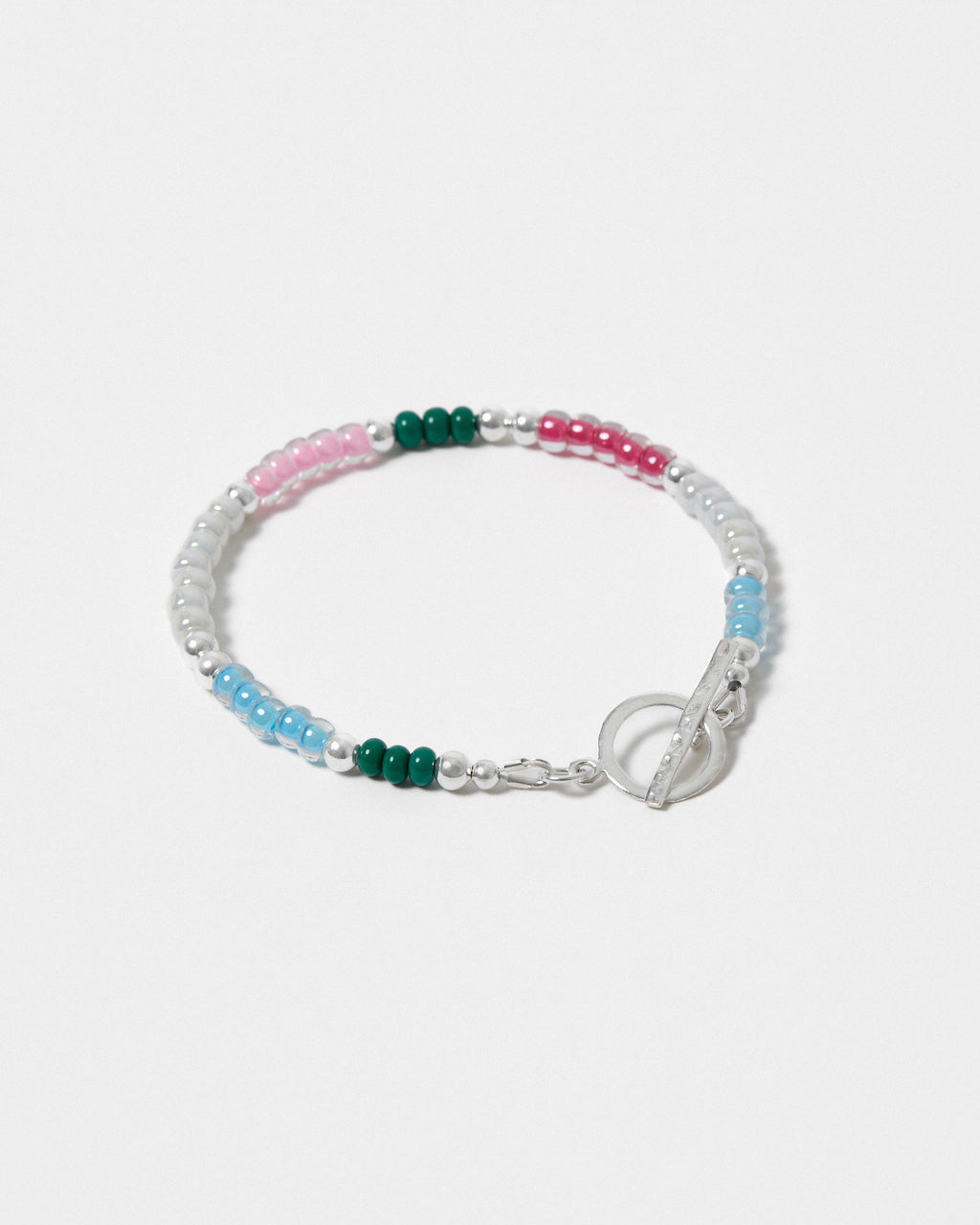 Beaded bracelet with pink, green, and blue beads on a white background